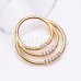 Golden Triple Row Front Facing Multi Gem Steel Seamless Hinged Clicker Ring Golden Triple Row Front Facing Multi Gem Steel Seamless Hinged Clicker Ring